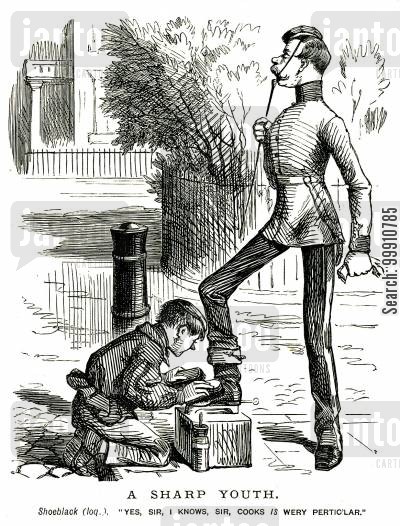 Boy cleaning servant's shoes